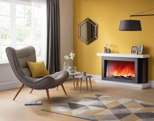 Living room with a chair and the AGA Rayburn extra tall suite electric fire with red flames