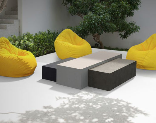 Bean bags and the Blinde Design Bloc  concrete coffee table in the colours bone, graphite and natural