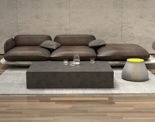 Sofa and the Blinde Design Bloc  concrete coffee table in the colour natural