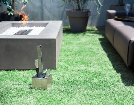 View of a garden with the EcoSmart Fire Accessory Holder in the colour stainless steel