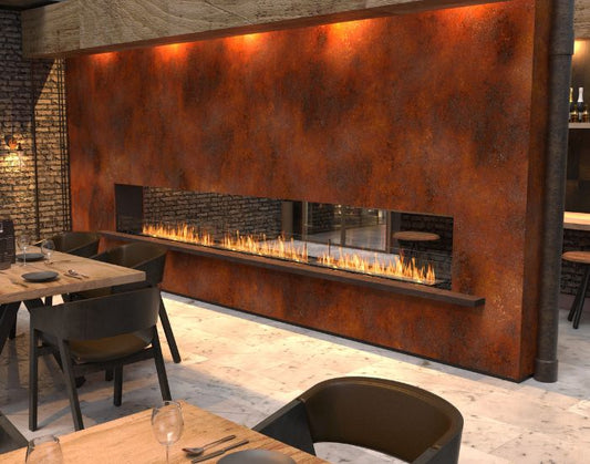 View of a restaurant with the EcoSmart Fire Flex 158DB Double Sided Fireplace Insert 