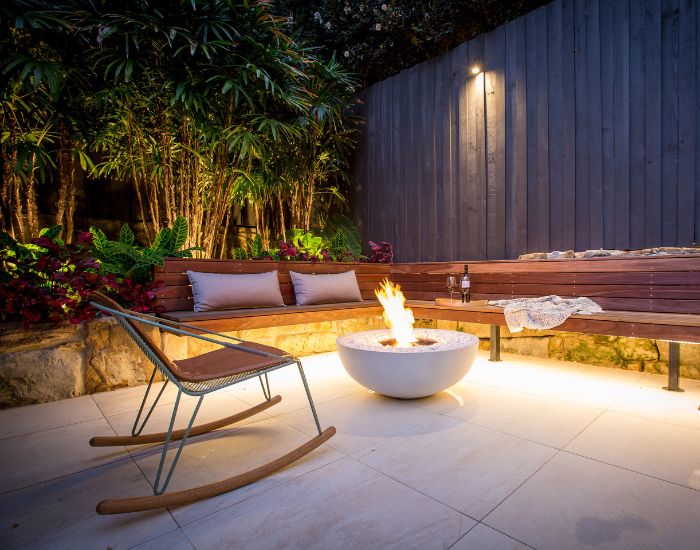 View of the EcoSmart Fire Mix 850 Bioethanol Fire Pit Bowl in the colour bone next to a seating area