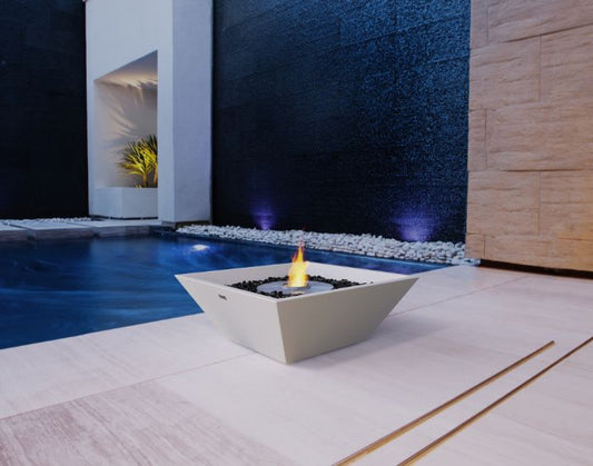 View of the EcoSmart Fire Nova 600 Bioethanol Fire Pit Bowl in the colour bone next to a pool