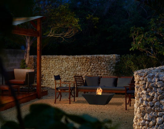 View of a porch with the EcoSmart Fire Nova 850 Bioethanol Fire Pit Bowl in the colour graphite