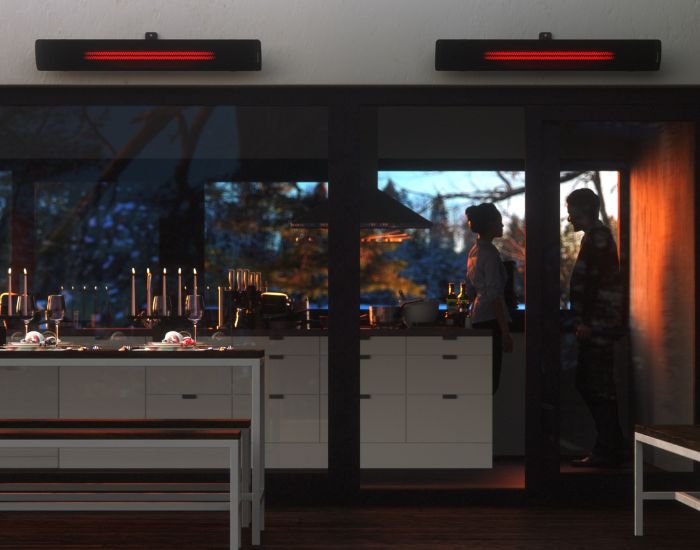 View of a kitchen with two Heatscope Pure 2400w Radiant Heaters in the colour black mounted on a wall