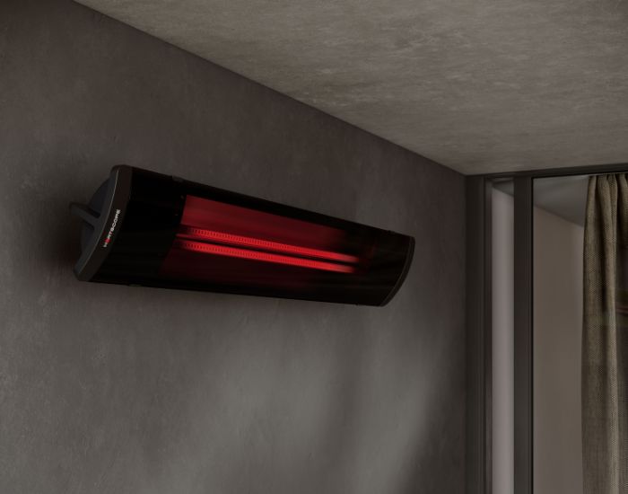 Up close view of the Heatscope Pure 3000w Radiant Heater in the colour black mounted on a wall