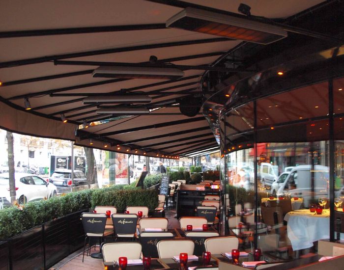 View of a restaurant with several Heatscope Spot 2800w Radiant heaters in the colour black