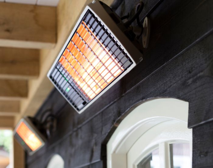 Close up view of the Heatscope Spot 2800w Radiant Heater in the colour black mounted on a wall