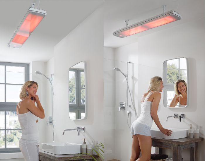 View of a bathroom with two Heatscope Vision 3200w Radiant Heaters in the colour white mounted on the ceiling