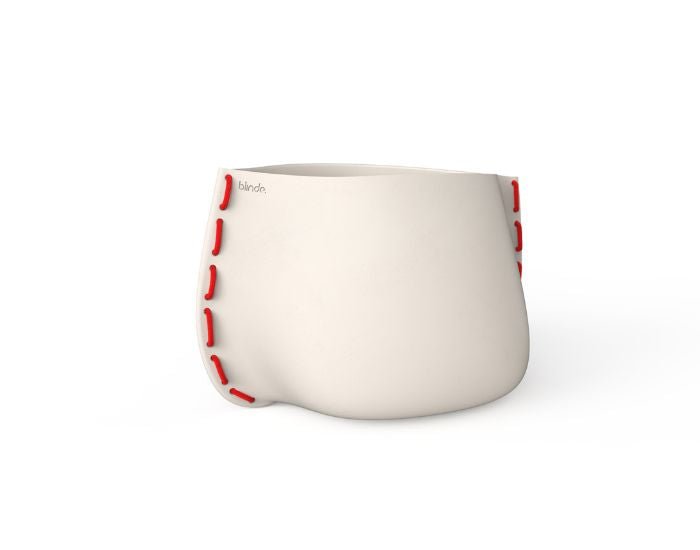 Studio view of the Blinde Design Stitch 100 concrete planter in the colour bone with red stitching